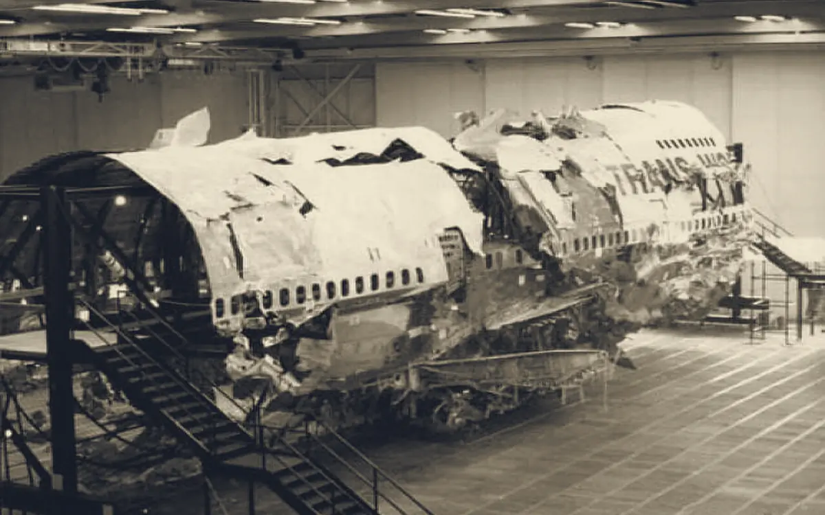 The reconstructed fuselage of TWA Flight 800 inside the NTSB investigators' hangar in Calverton, New York